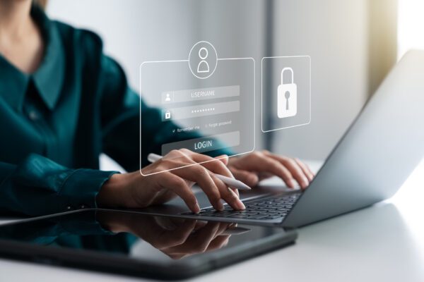 Business security login interface on tablet and laptop